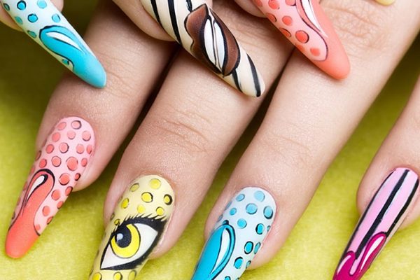 Long beautiful manicure in pop-art style on female fingers. Nail [object object] Why Choose Sassy Nails? nail about us 600x400